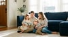Couple relaxing at home without mortgage payment stress